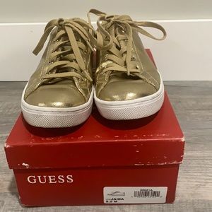 Guess women gold shoes size 8.5 / used